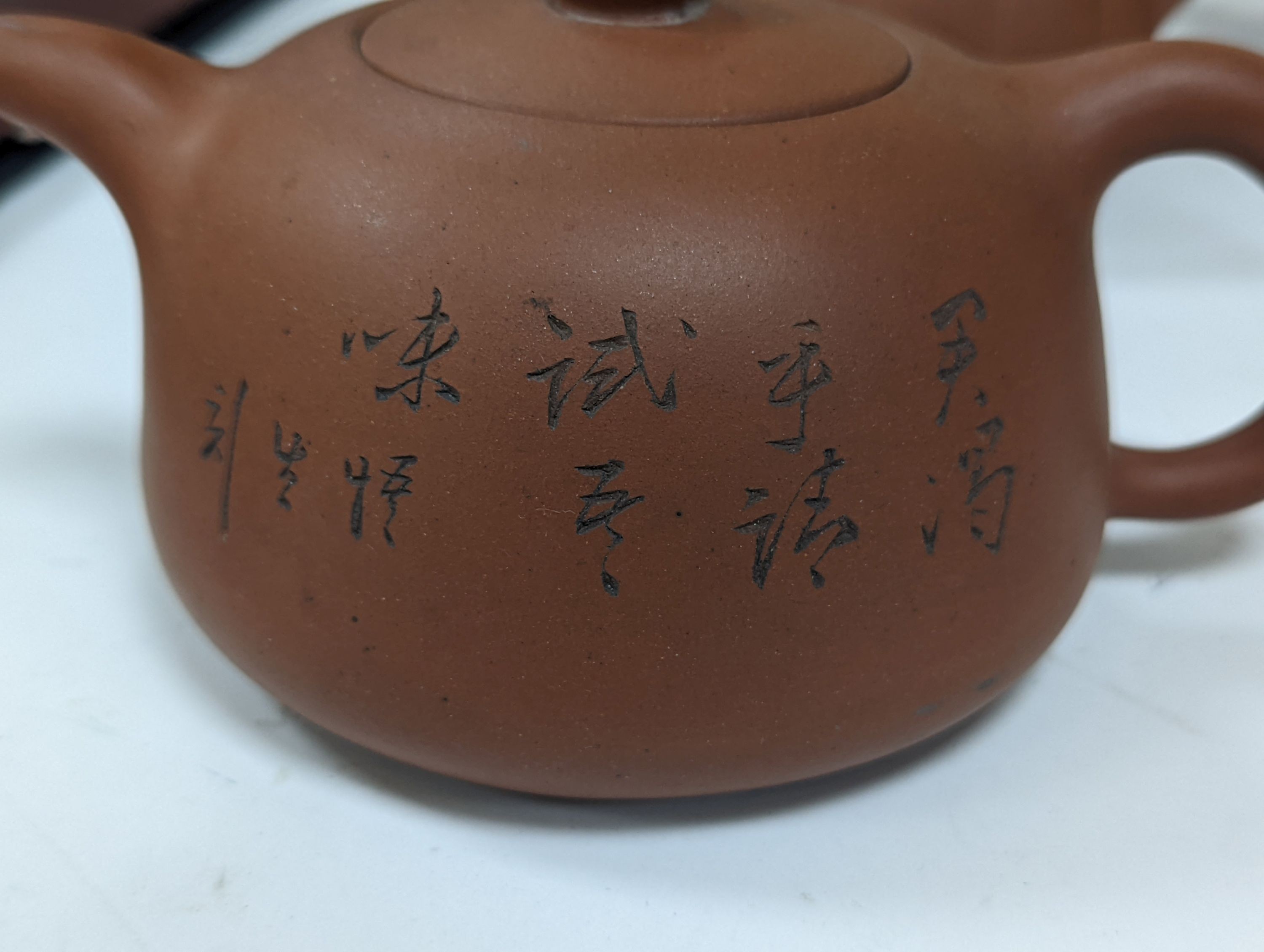 Six Chinese Yixing teapots, tallest 11cm